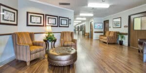 Sitting area and hallway of South Creek Post Acute