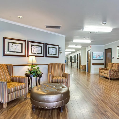 Sitting area and hallway of South Creek Post Acute